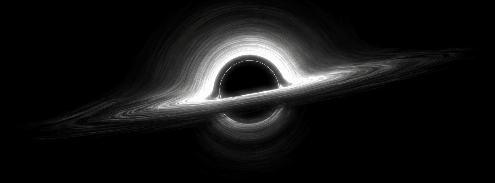 A black hole surrounded by a glowing accretion disk in deep space